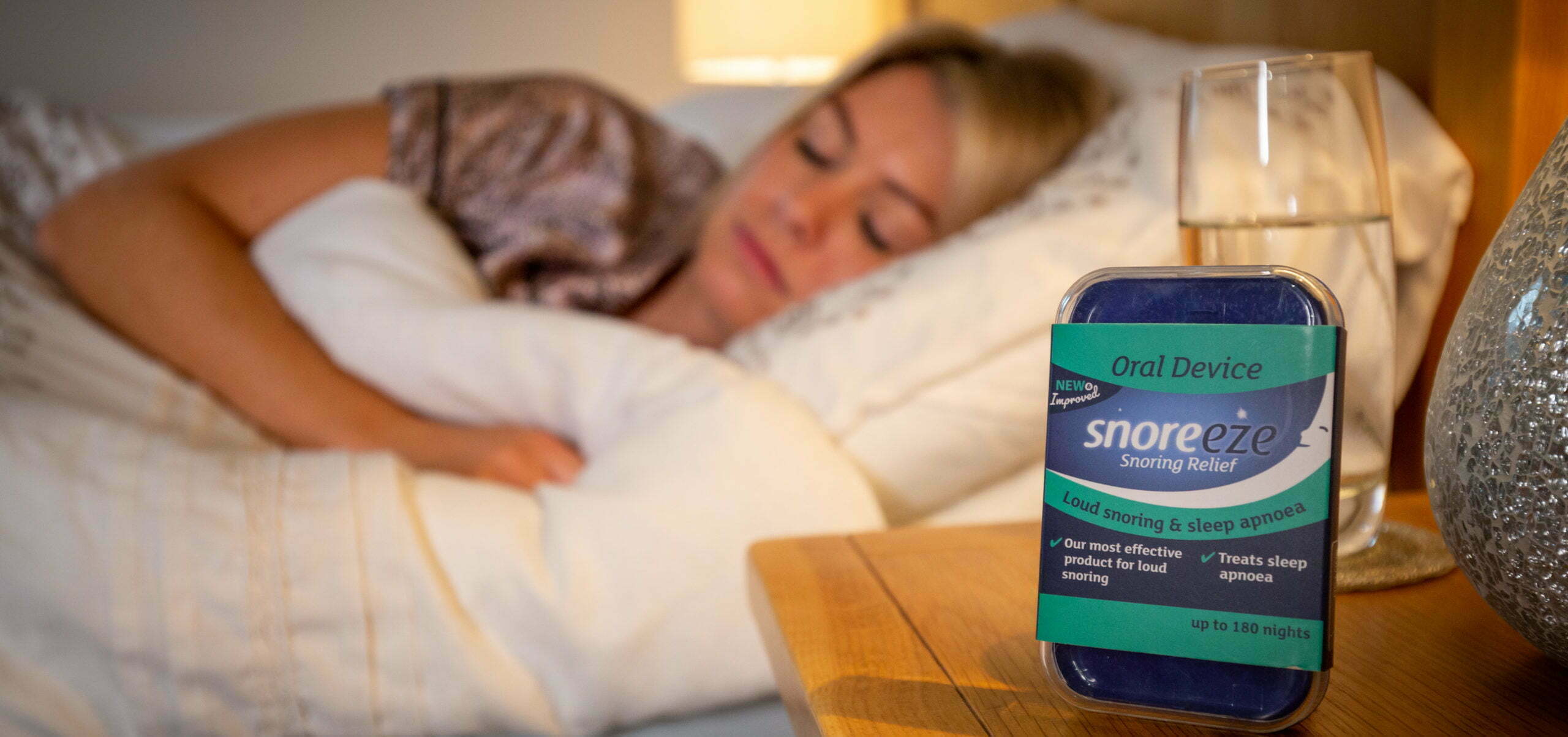 Mandibular advancement device to treat snoring on bedside table